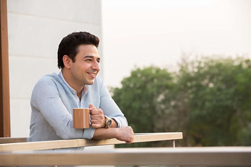 Founder enjoying a quiet morning on a balcony — founder photography Dubai