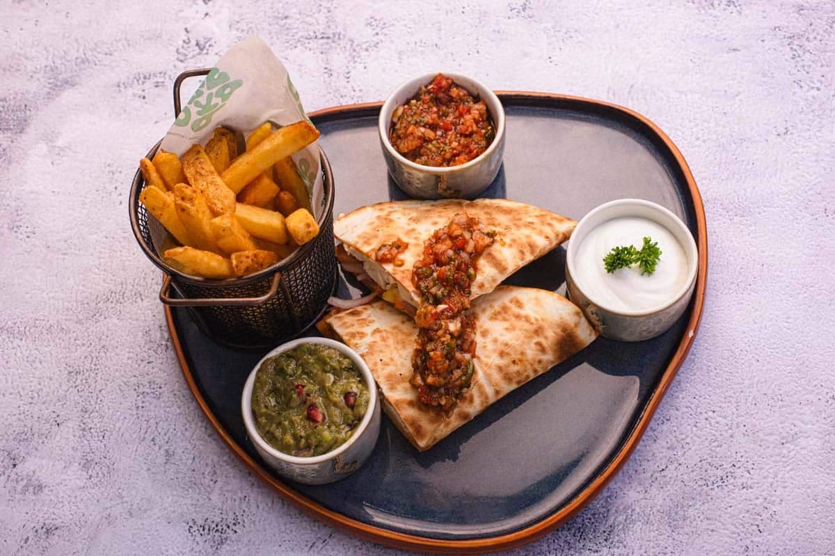 Wraps and fries styled for a café menu — hospitality photography by Imagesque, Dubai