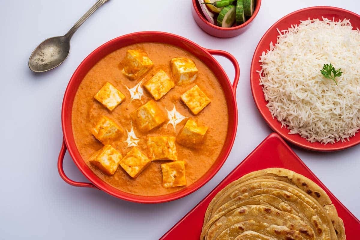 Paneer curry with rice and paratha — hospitality photography by Imagesque, Dubai