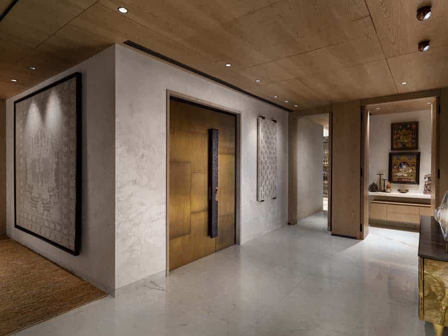 Marble lobby corridor with timber panelling — hospitality photography by Imagesque, Dubai